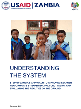 The front page of a report which includes a photo of schoolchildren posing for a photo above the title "Understanding the system"