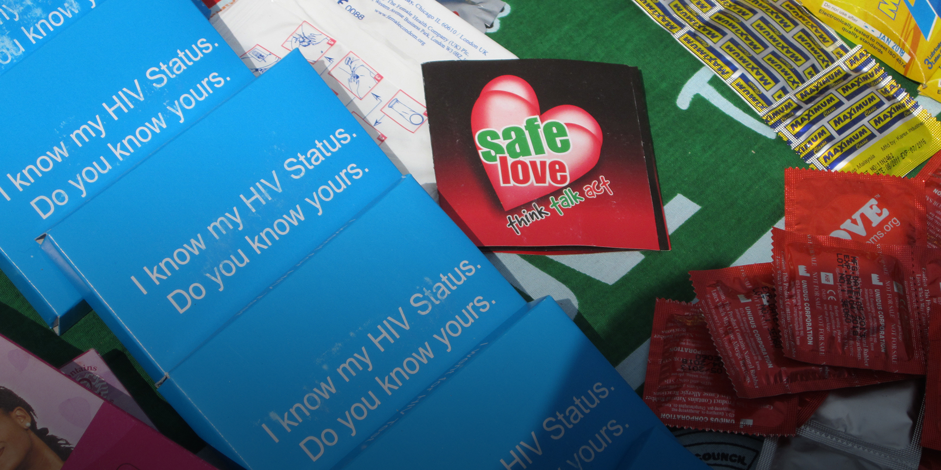 Image of safe sex promotional materials with text written on them such as 