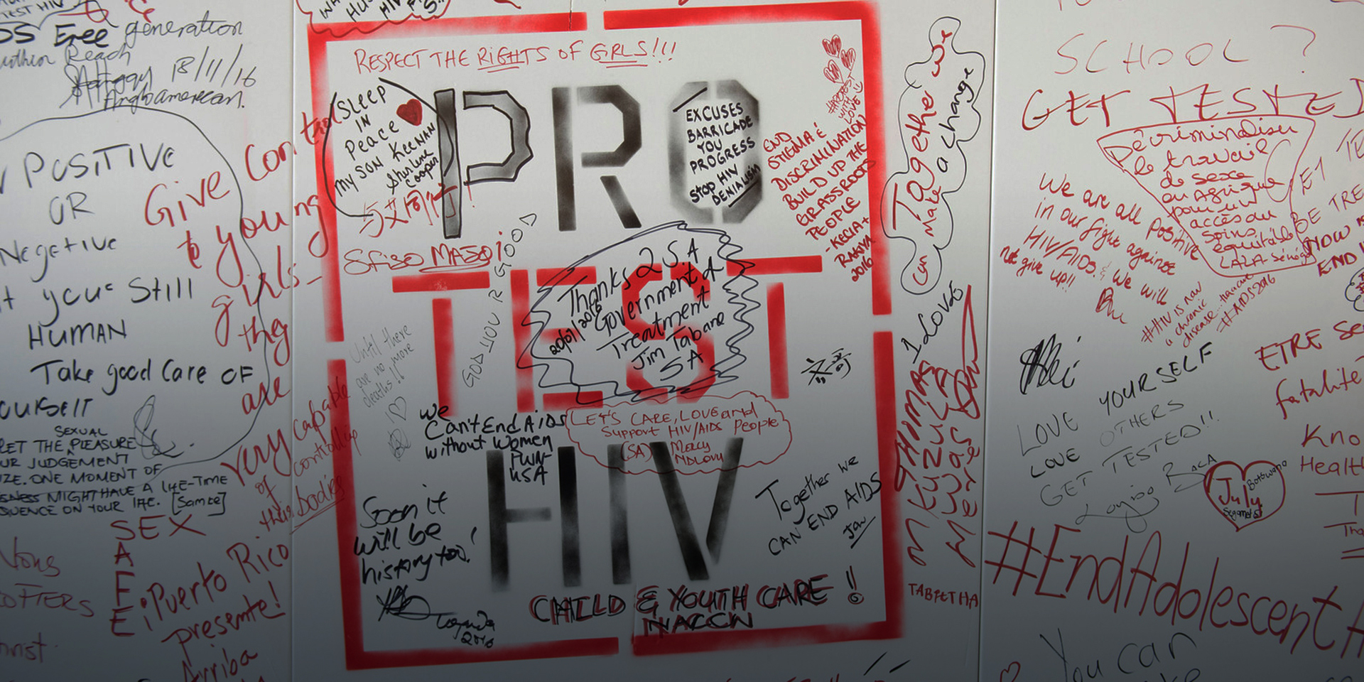A white board covered in written messages including 