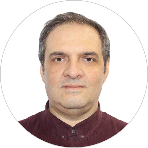 A professional headshot of Dr. Kartlos Kankadze.