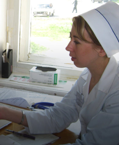 A patient speaks with a health worker