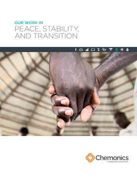 The front page of a report titled "Our Work In Peace, Stability, and Transition." Includes image of two people holding hands.