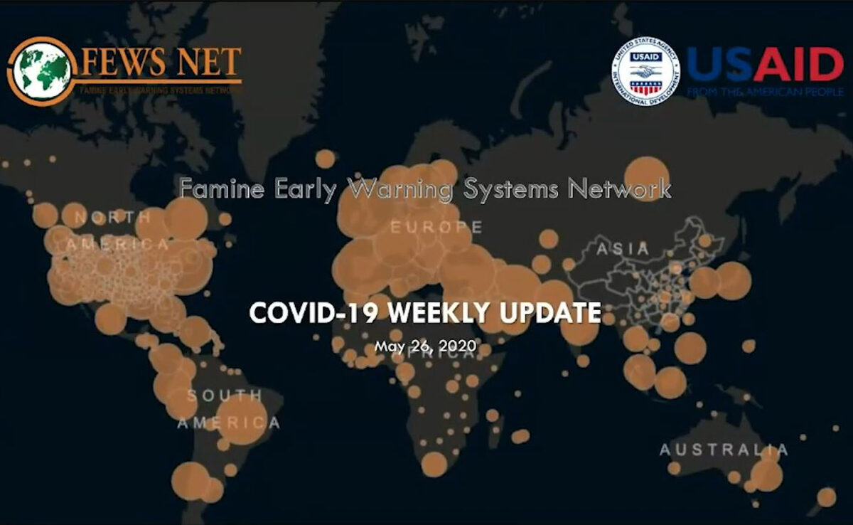 A graphic showing several orange circles in different shapes over parts of a world map. Overlaid is the text "COVID-19 Weekly Update."