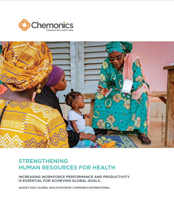 The front page of a report titled "Strengthening Human Resources for health; Increasing Workforce Performance and Productivity is Essential for Achieving Global Goals." Includes image of an older woman sitting on a bench and speaking with women and children sitting on a floor mat.