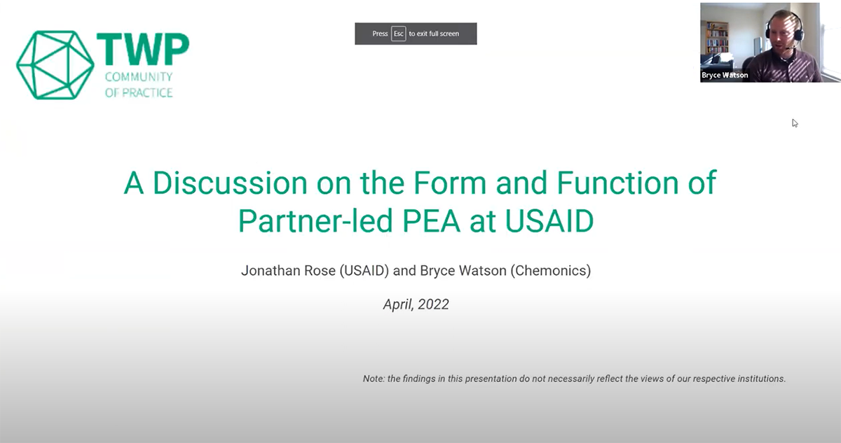 A slide that reads "A Discussion on the Form and Function of Partner-led PEA at USAID; Jonathan Rose (USAID) and Bryce Watson (Chemonics); April, 2022." In the top left is a hexagonal logo that reads "TWP Community of Practice." In the top right is Bryce Watson on video call.