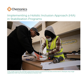 The cover page of the Holistic Inclusion Approach brief, which shows a man and woman working together.