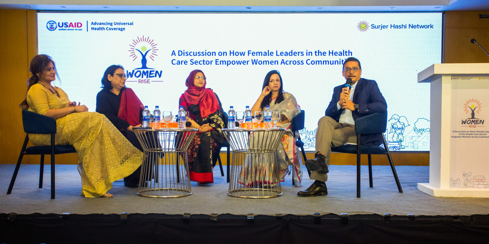 Panelists seated at the Women Rise event in Bangladesh.