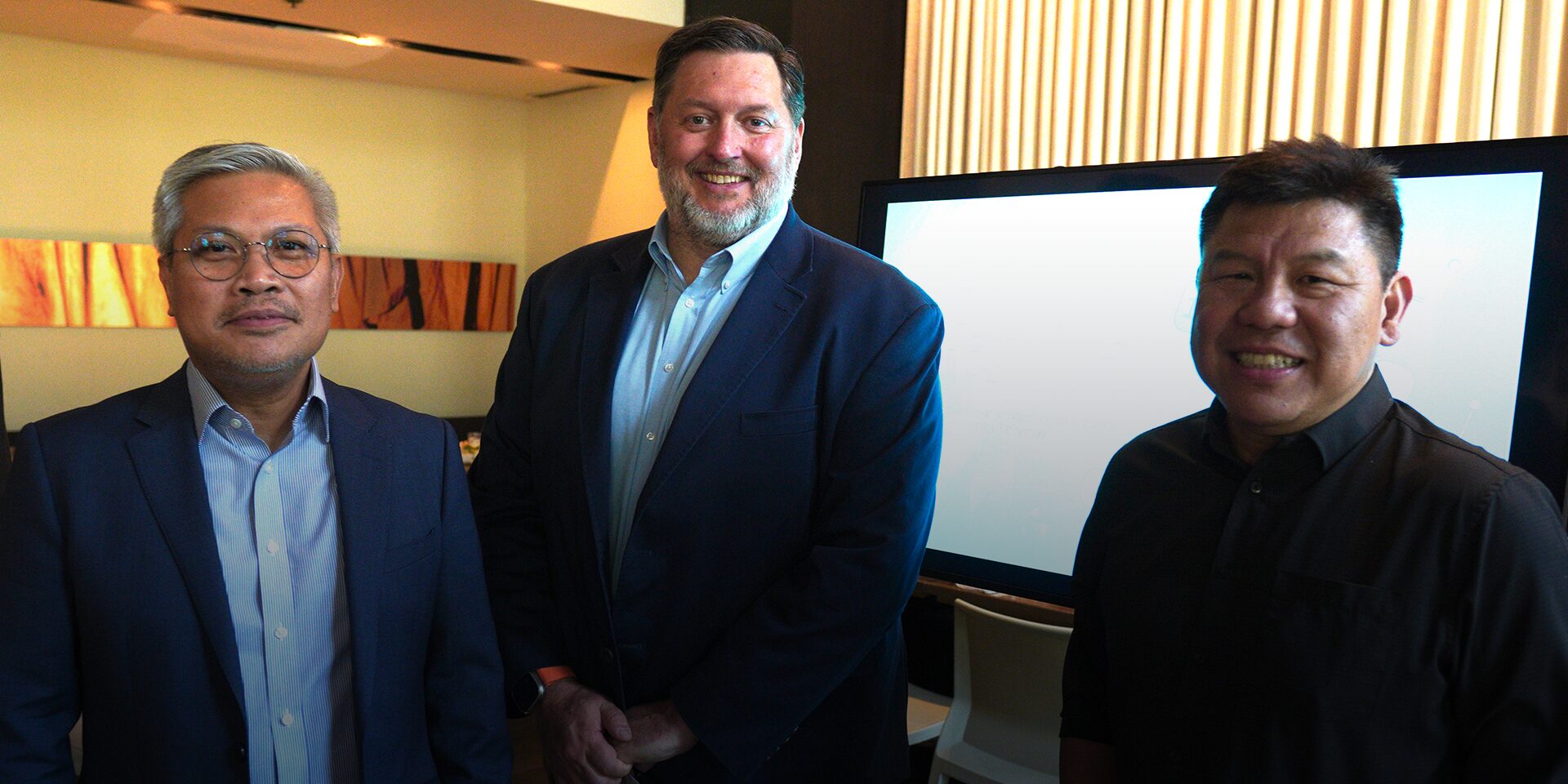 Chemonics CEO Jamey Butcher with Winston Damarillo, CEO of Talino Venture Studios; Vice Catudio, CEO of Higala Technology Inc.
