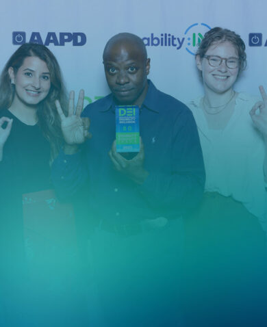 Five people celebrate winning an award.