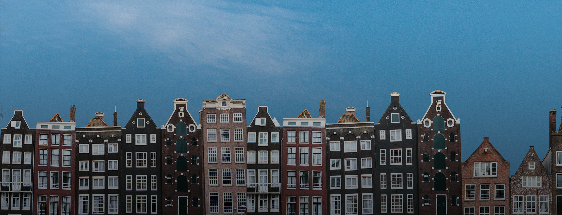 Panoramic view of a row of houses in Amsterdam